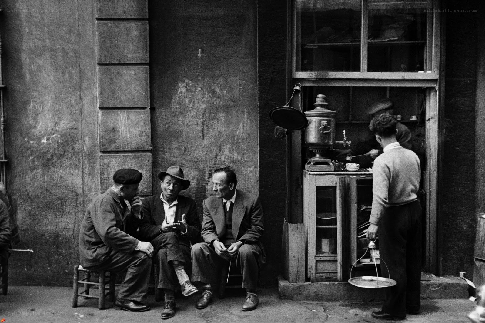 Men conversing on a street