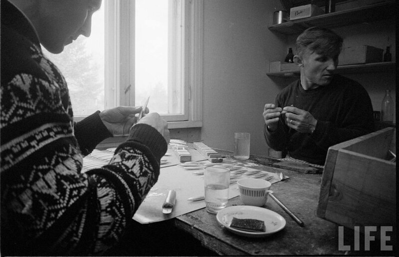 Men crafting at a table