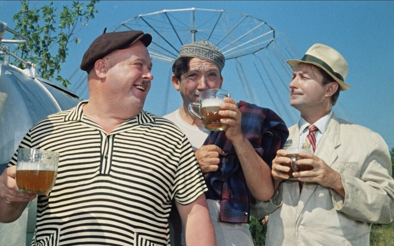 Men drinking beer outdoors