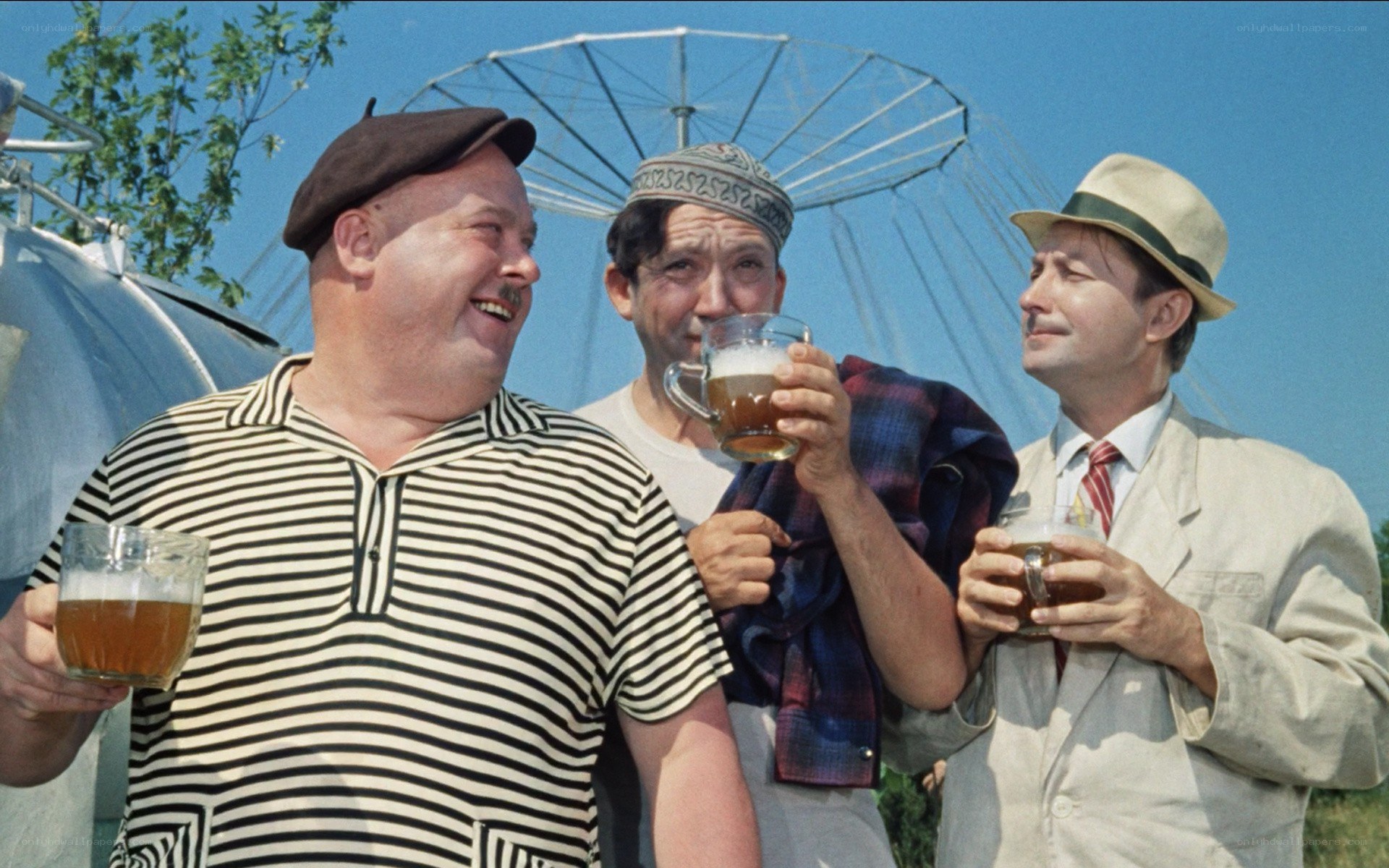 Men drinking beer outdoors