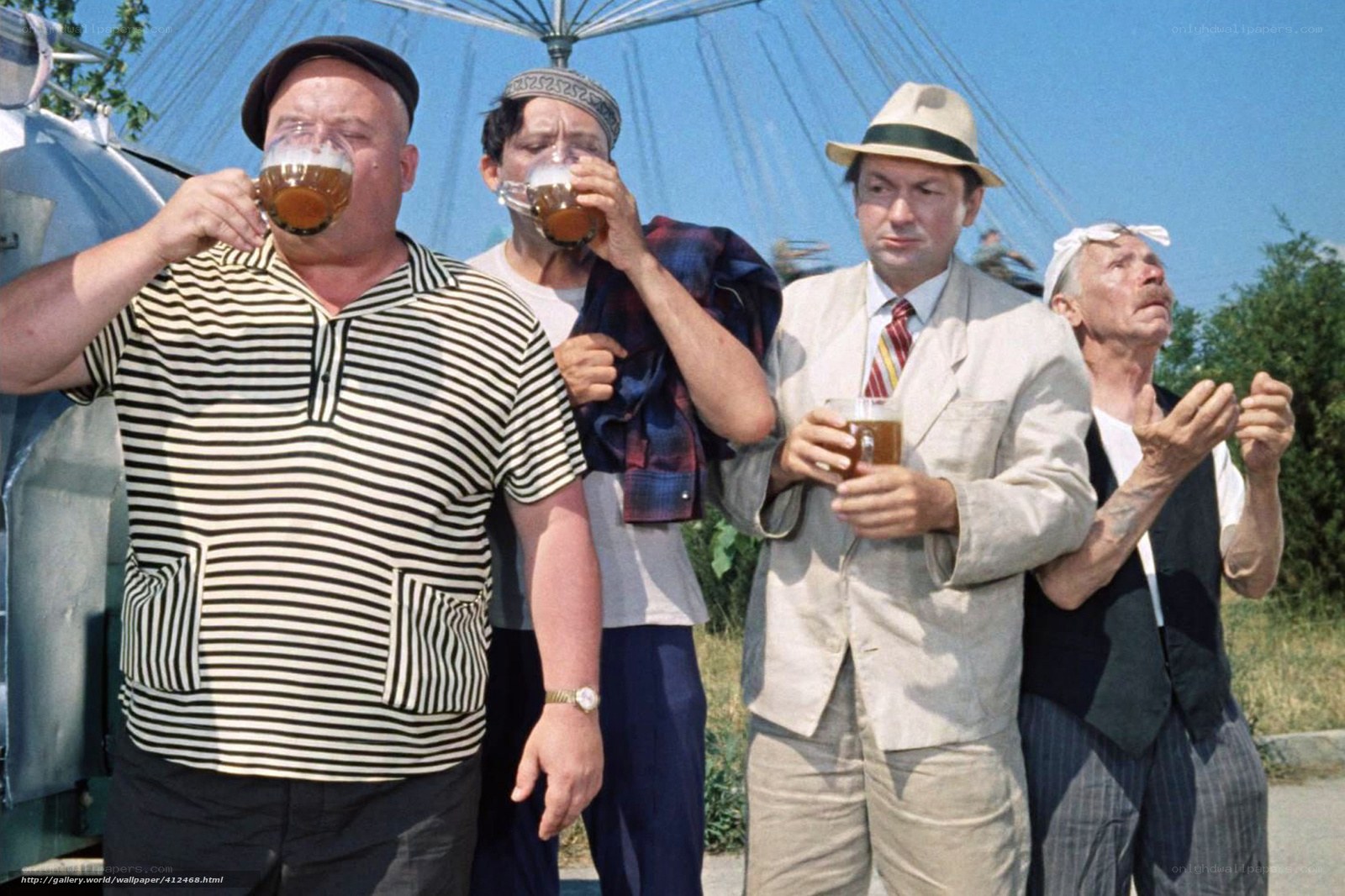 Men drinking beer outdoors