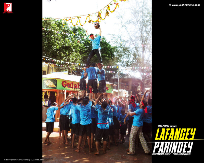 Men Forming a Human Pyramid