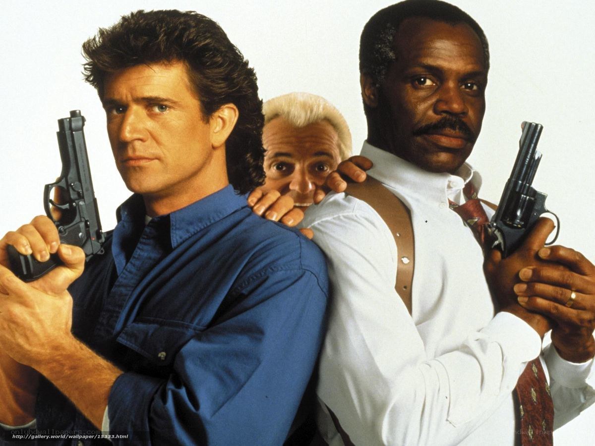 Men holding guns back to back