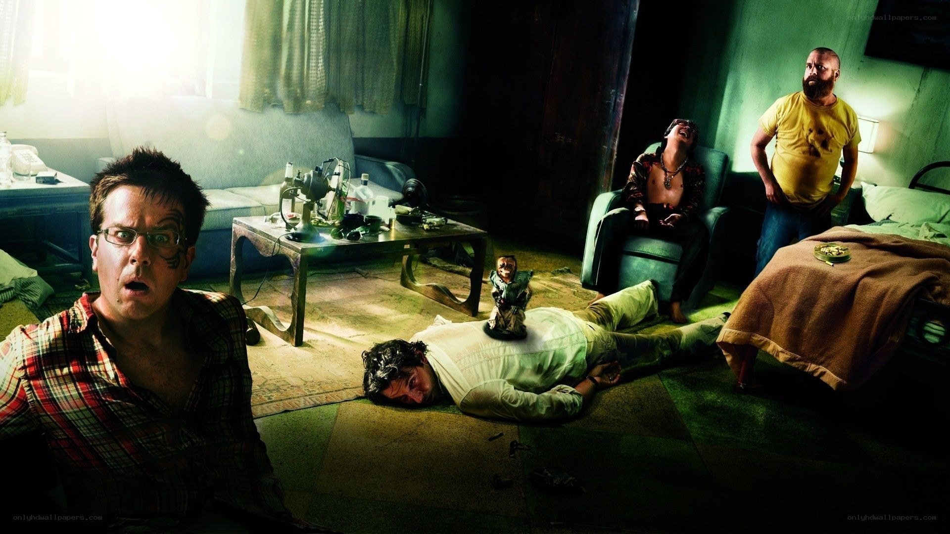 Men in a chaotic room