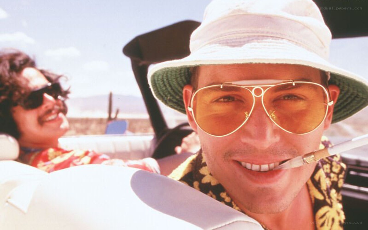 Men in a convertible car