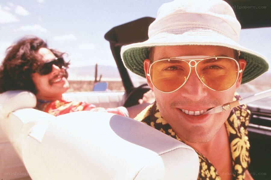 Men in a convertible car