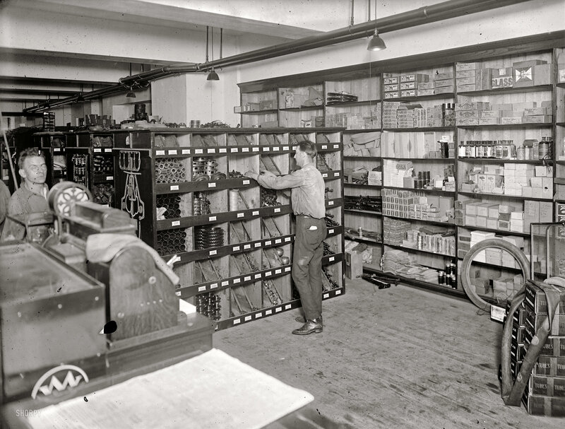 Men in a parts warehouse