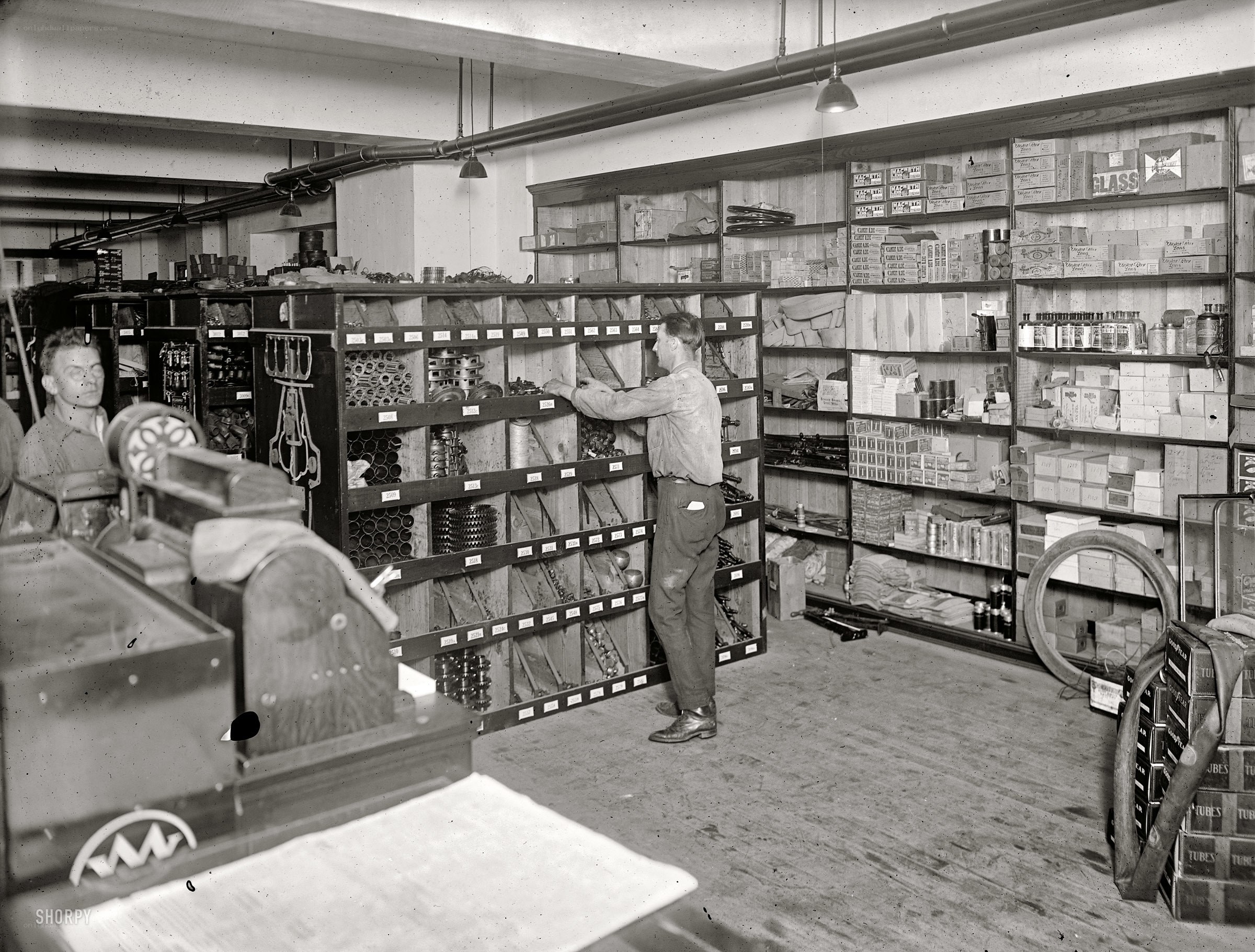 Men in a parts warehouse