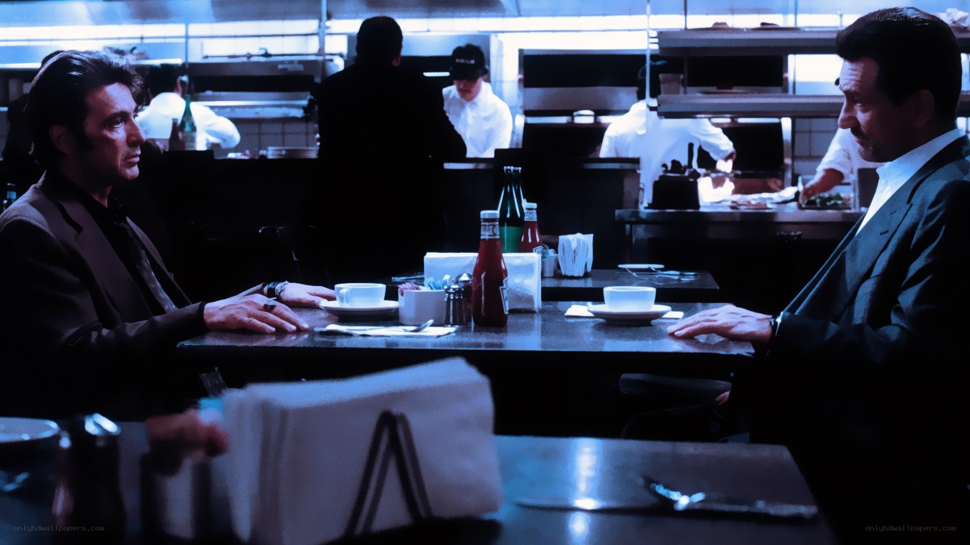 Men in a restaurant conversation