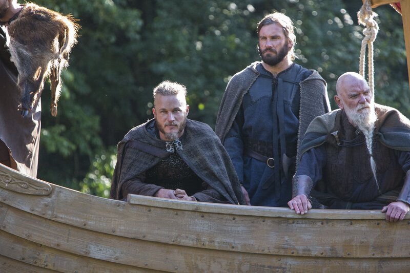 Men in a Wooden Boat
