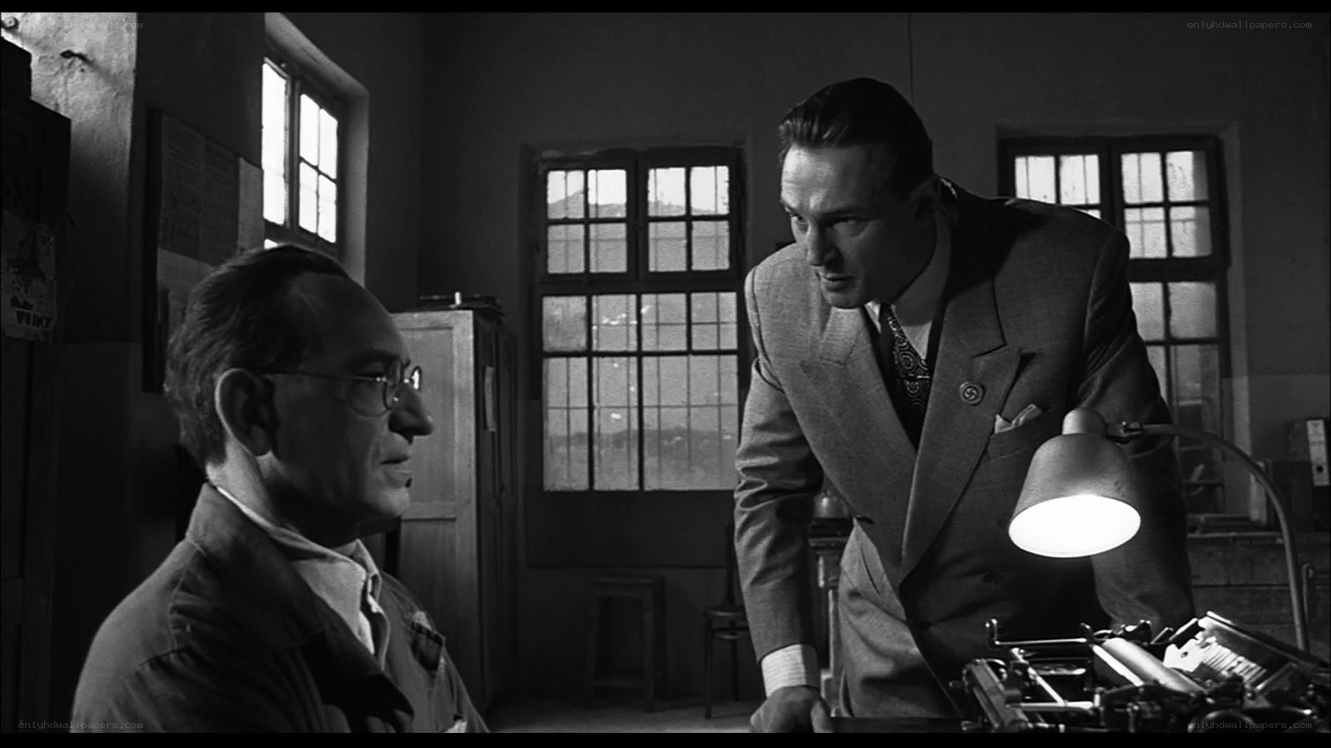 Men in an office scene
