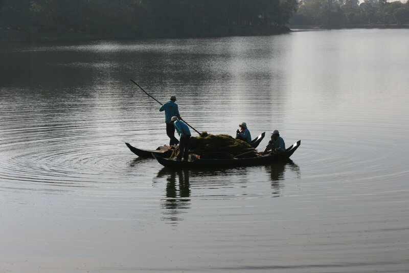Men in Boats on Lake