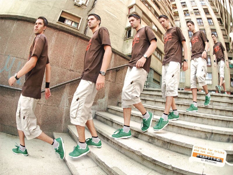 men in brown shirts walking down stairs