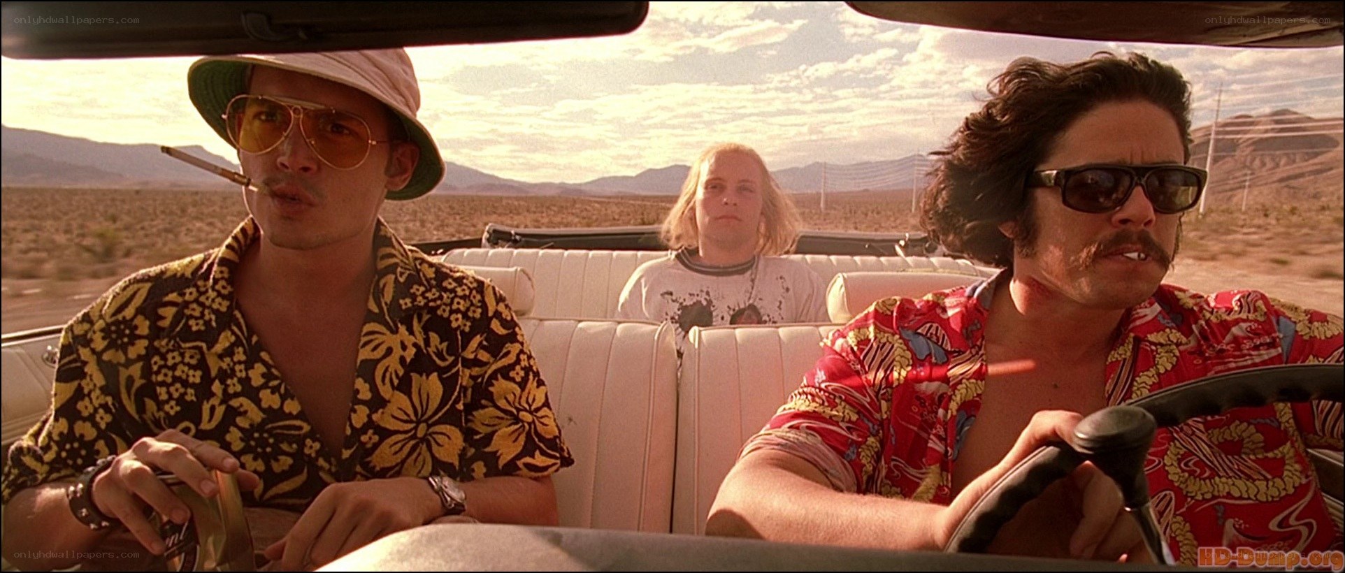 Men in convertible car