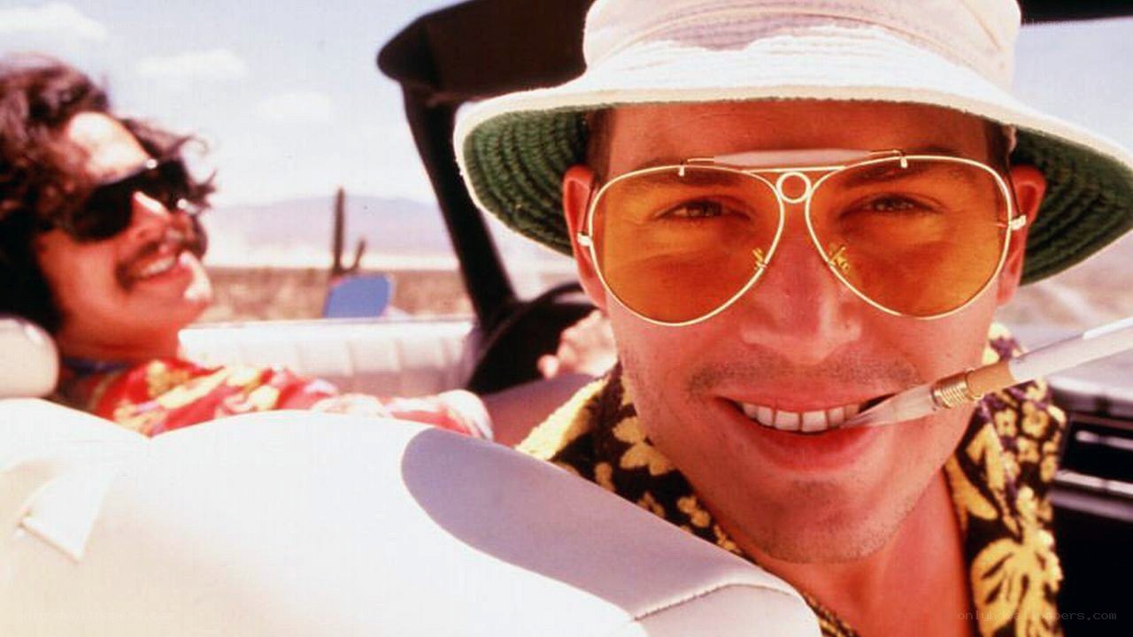 men in convertible car