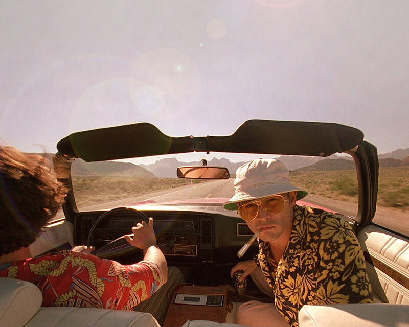 Men in convertible car