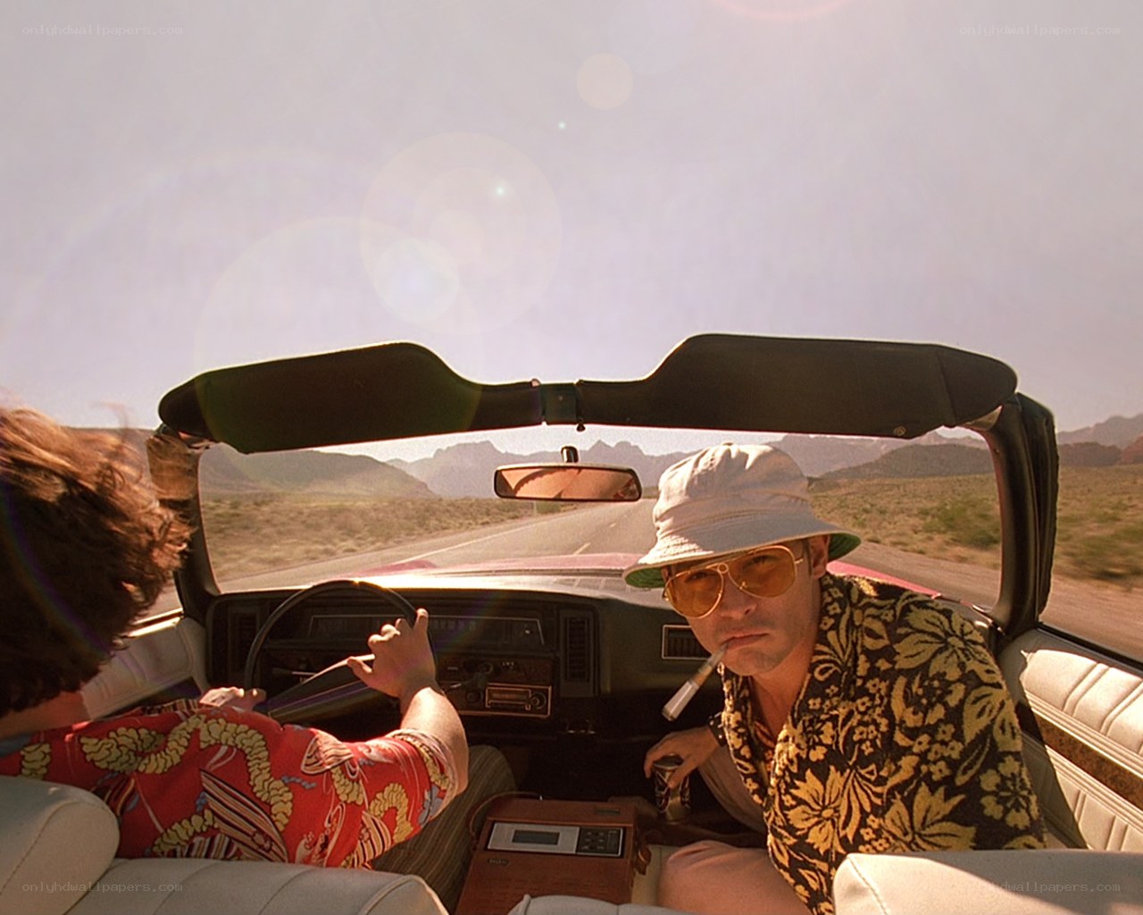 Men in convertible car