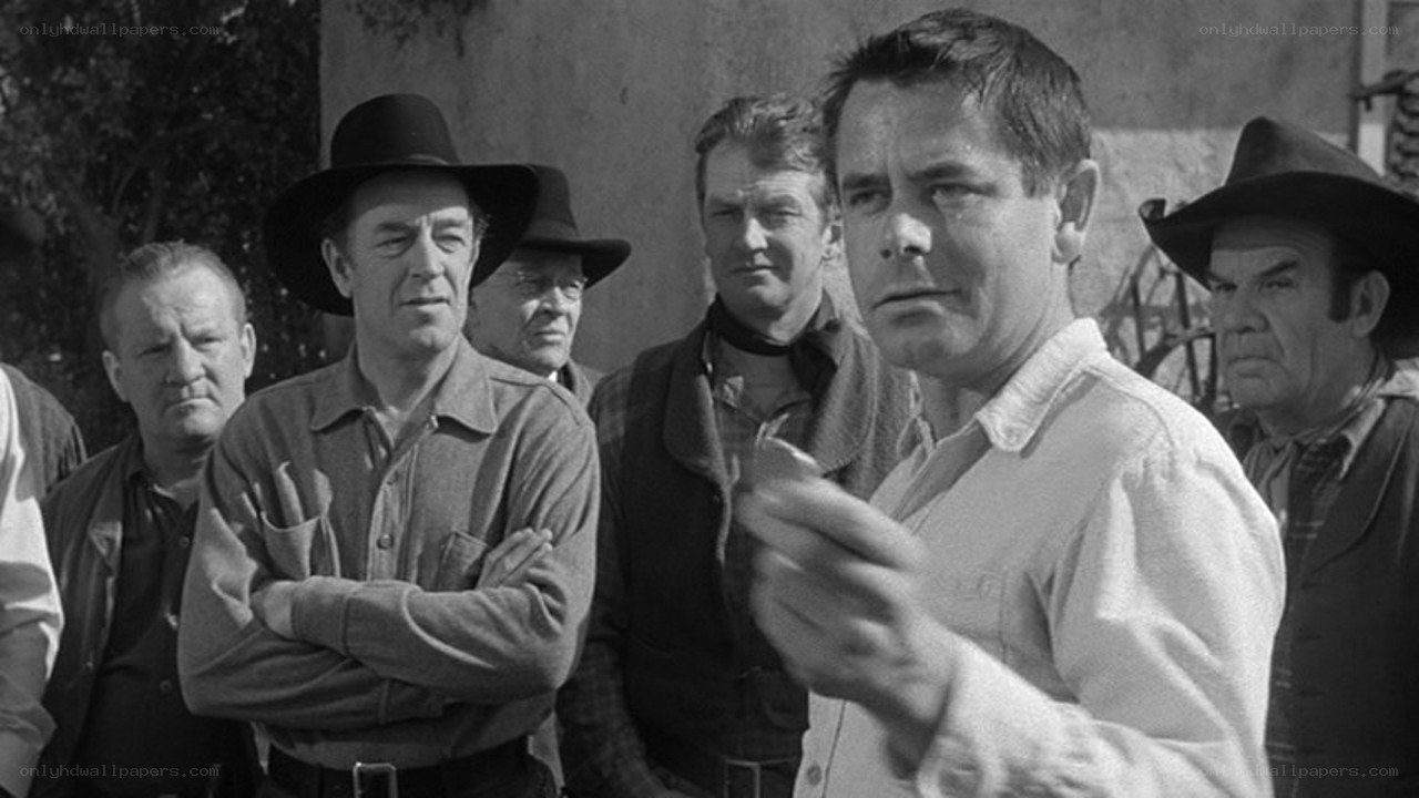 men in cowboy hats standing