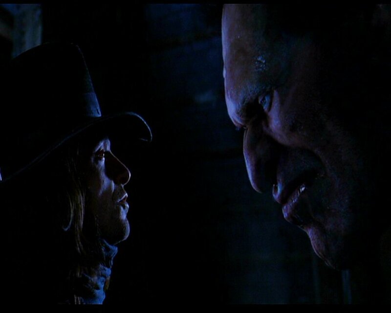 men in dark confrontation
