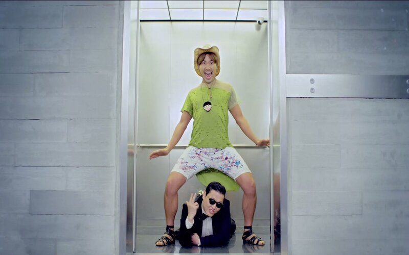 Men in elevator with props