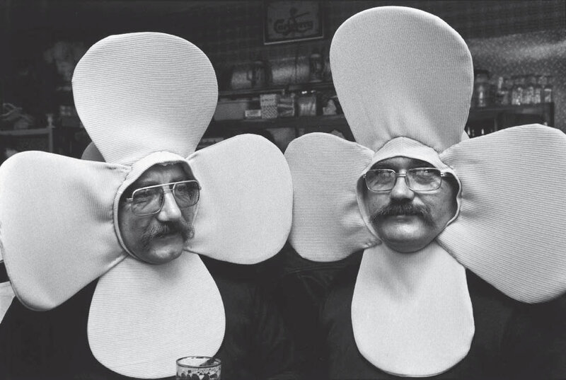 Men in flower costumes