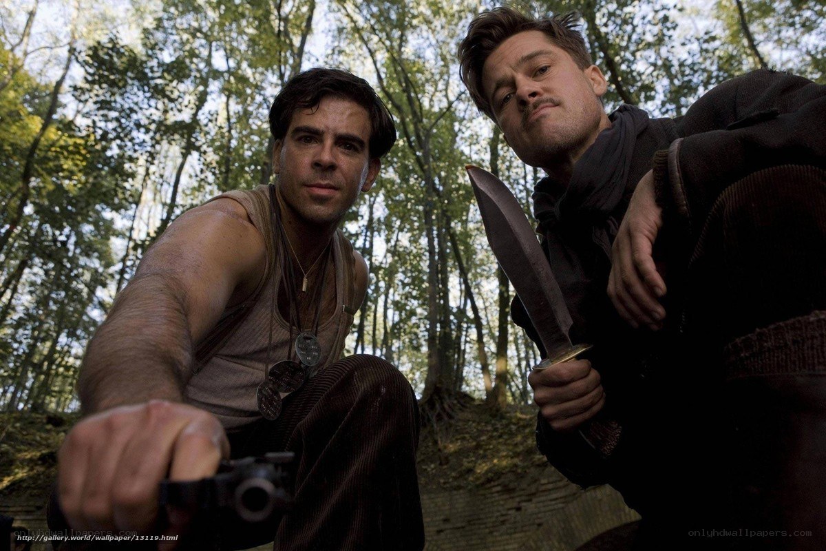 Men in forest with weapons