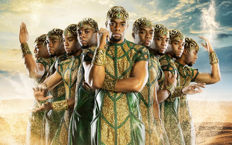 Men in Gold and Green Costumes