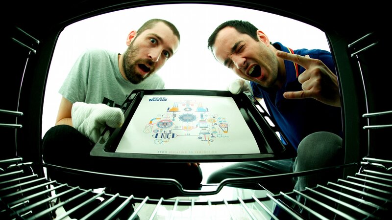 men in oven with tray
