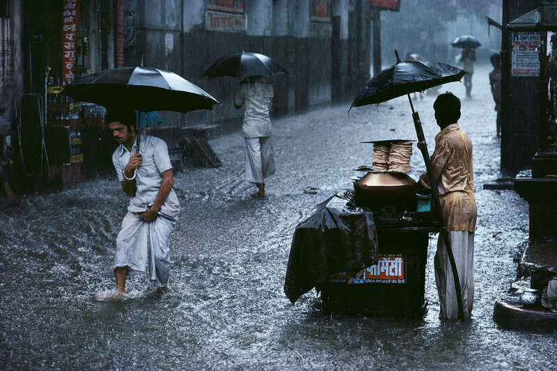 Men in Rainstorm