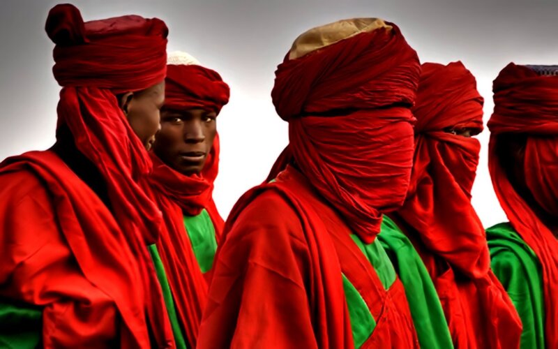 men in red turbans