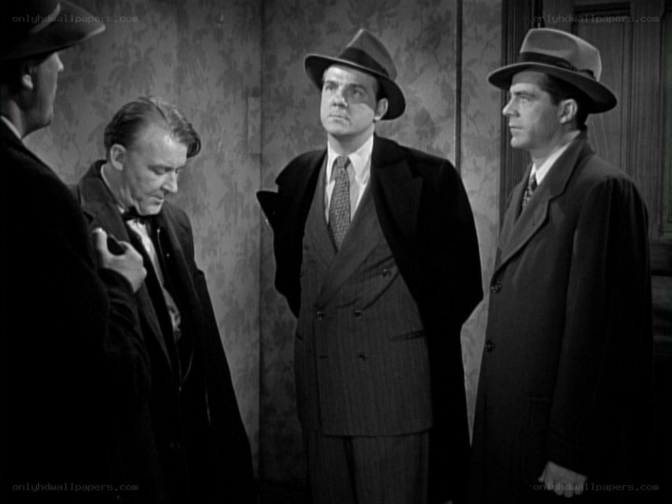 men in suits and hats