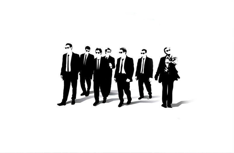 men in suits and sunglasses
