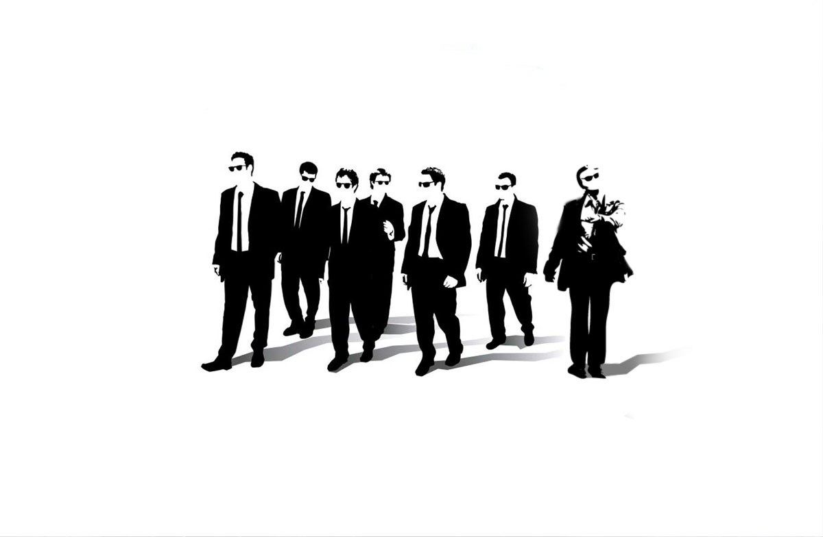 men in suits and sunglasses