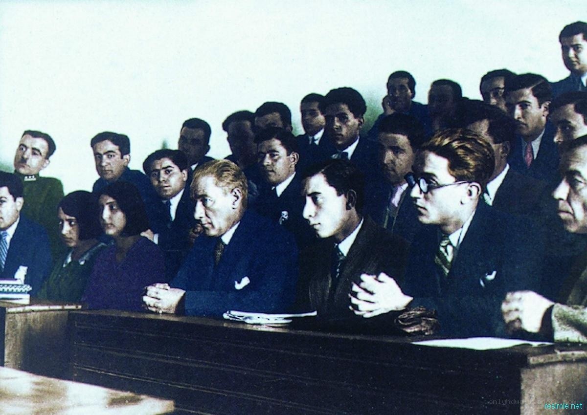 Men in suits at a formal gathering