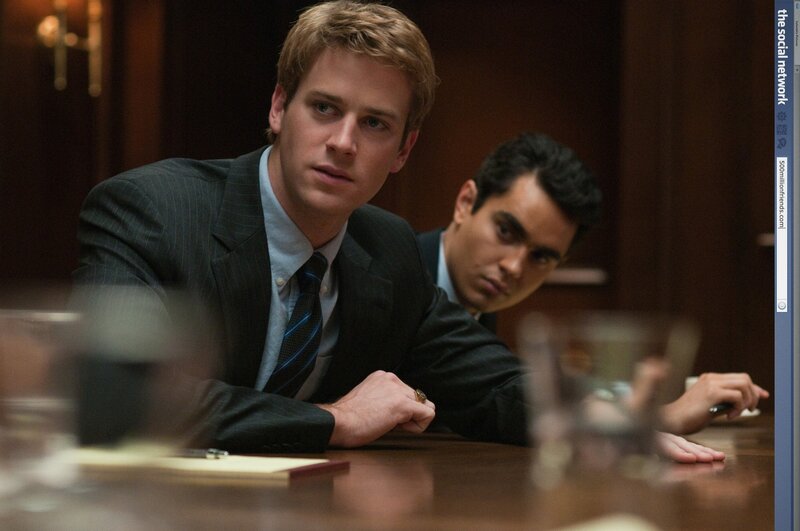 men in suits at a table