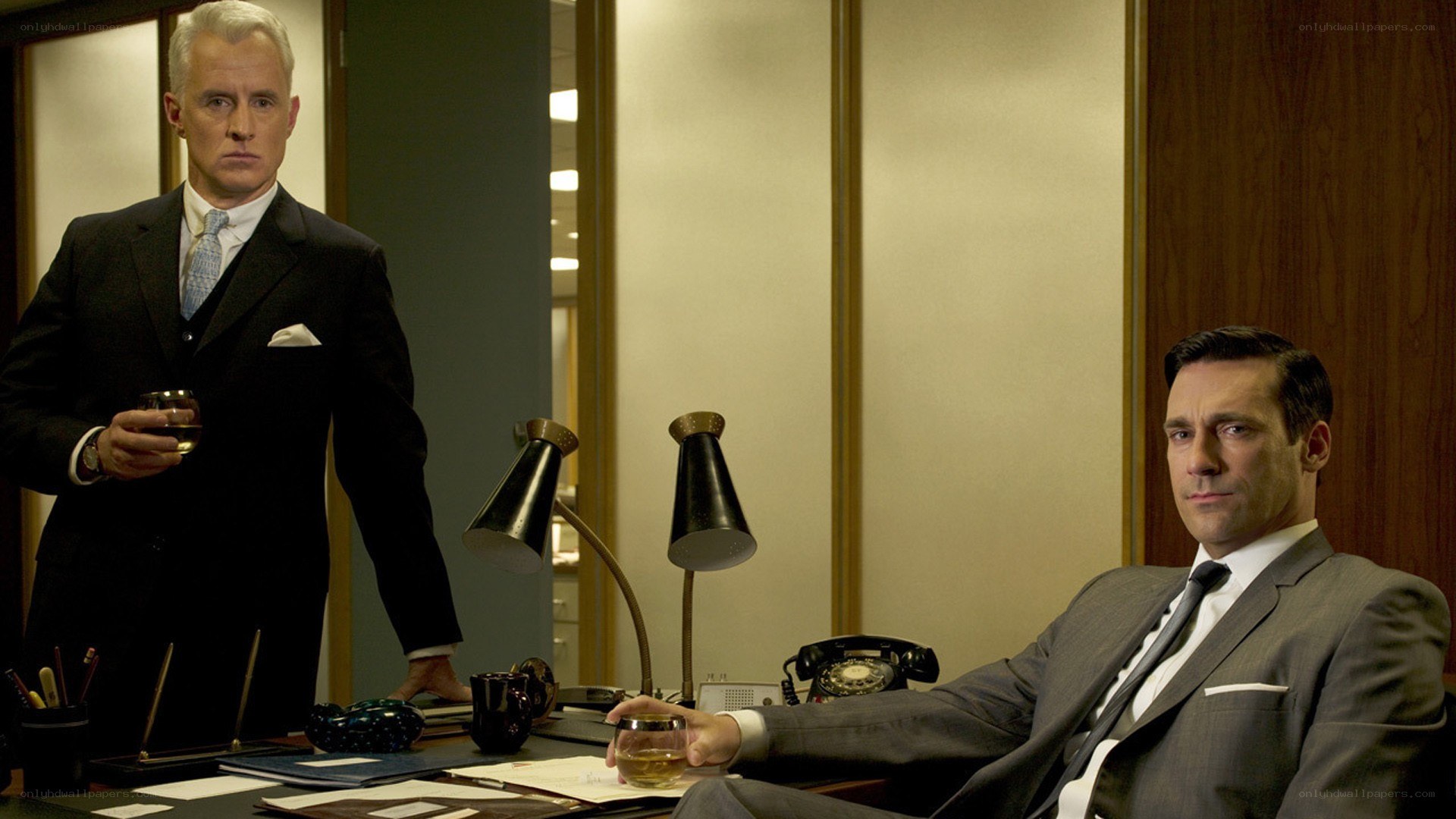 Men in suits at office desk