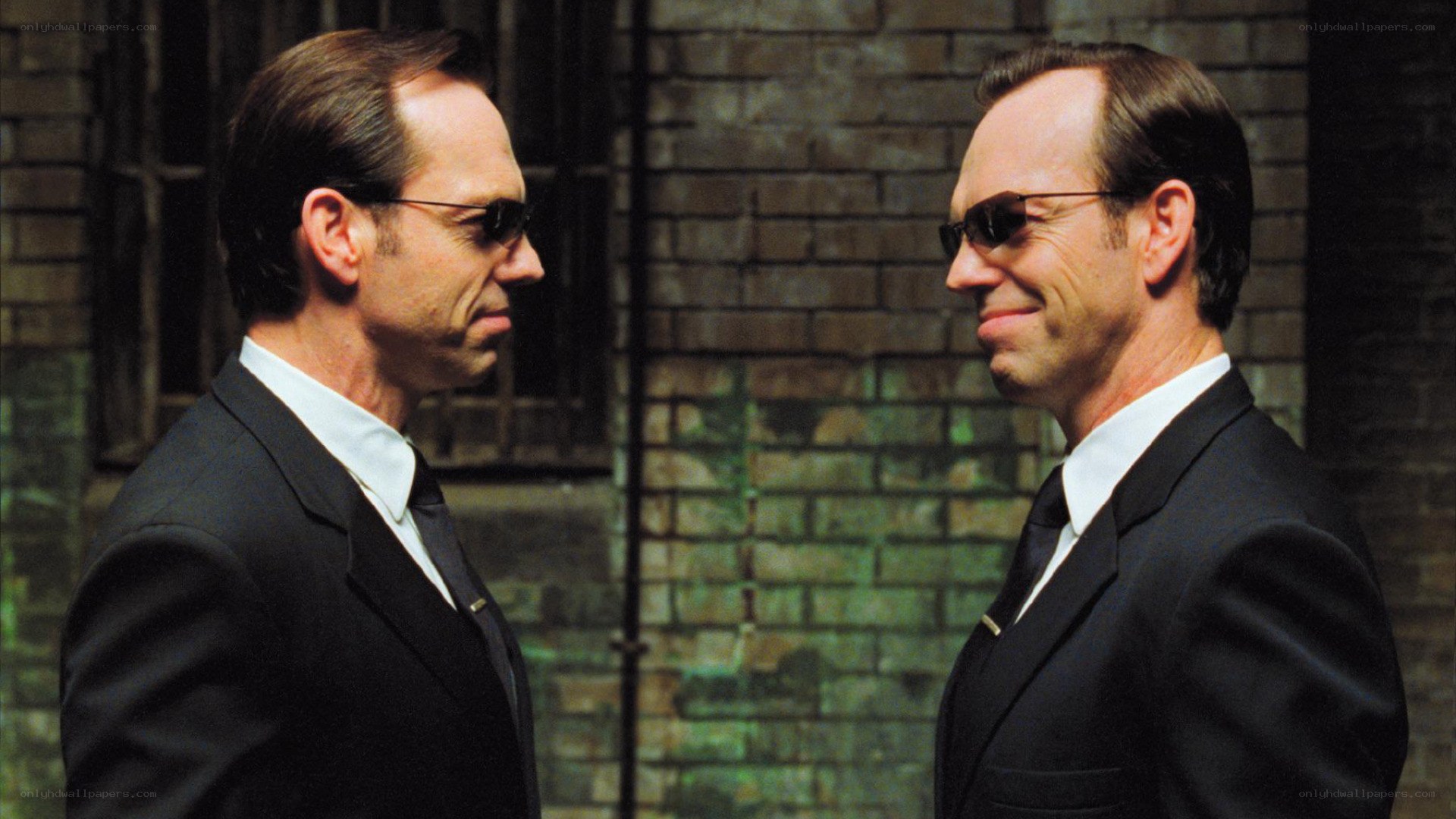 Men in suits facing each other