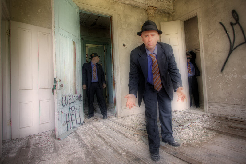 Men in suits in a derelict building