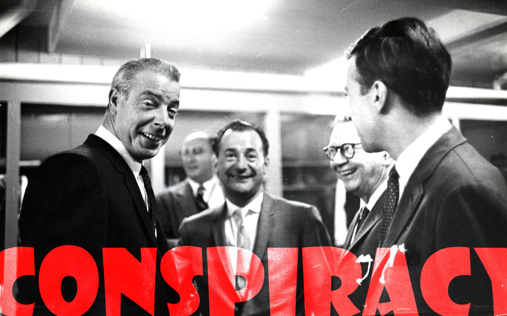 men in suits laughing