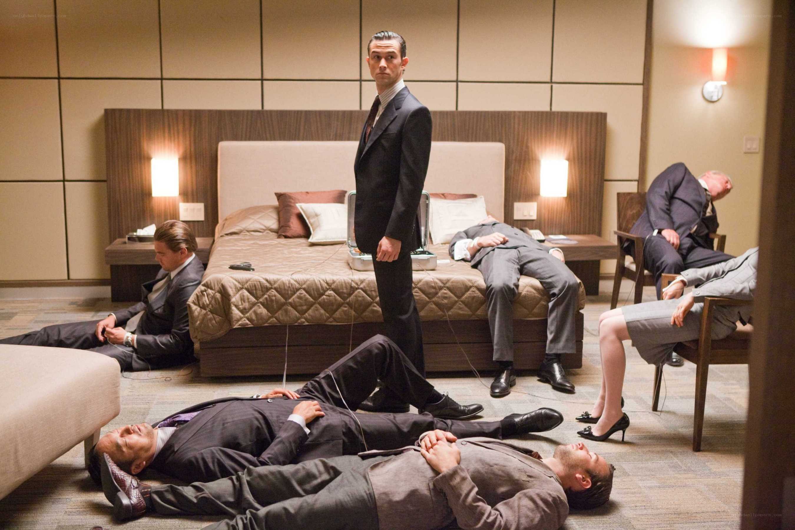 Men in suits lying on floor