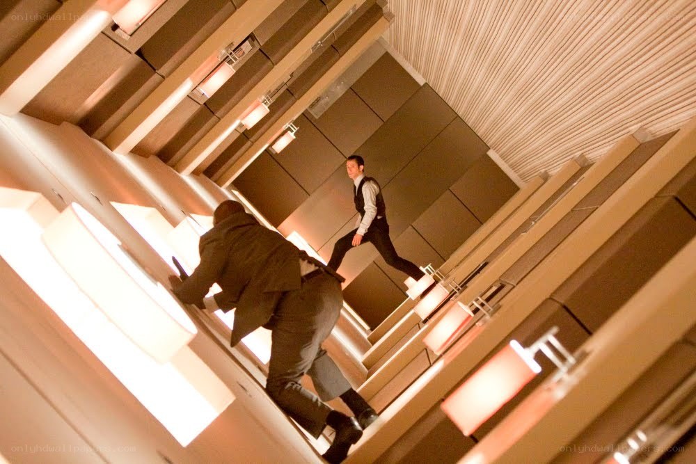 Men in suits on a tilted staircase