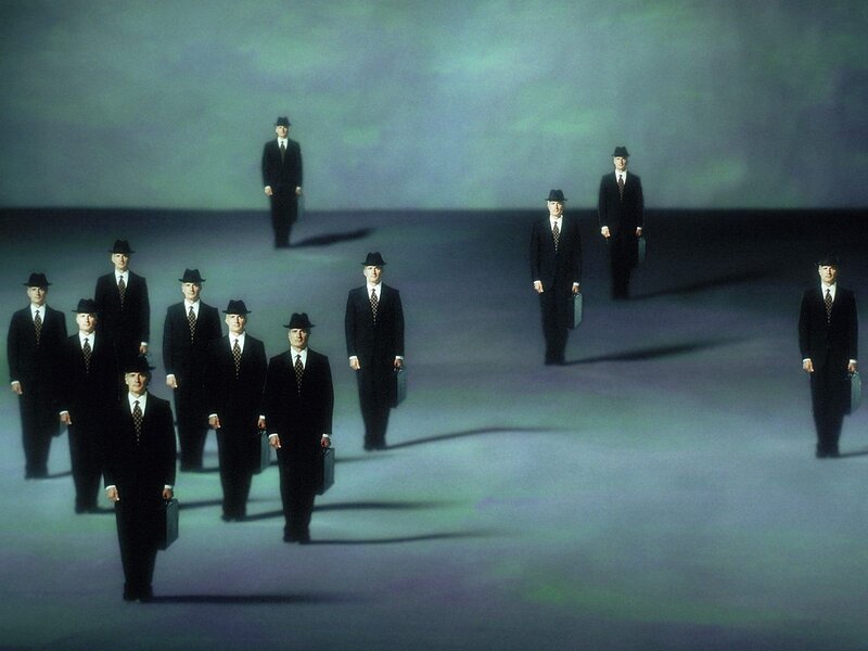 Men in suits walking in a line