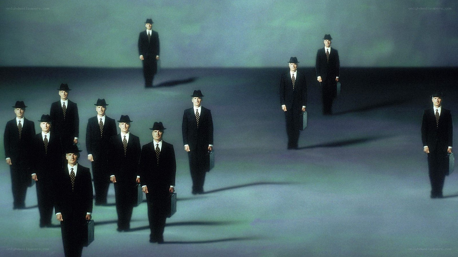 Men in suits walking in unison