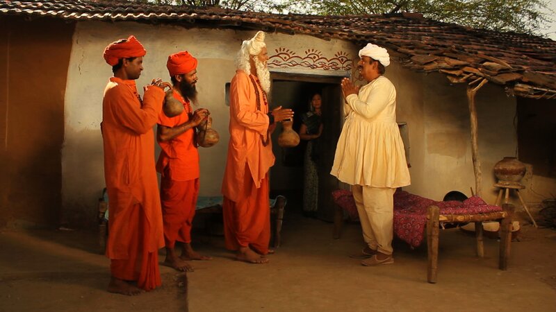 Men in Traditional Clothing — Orange