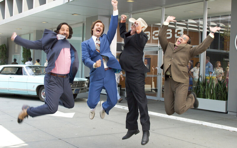 men jumping in suits