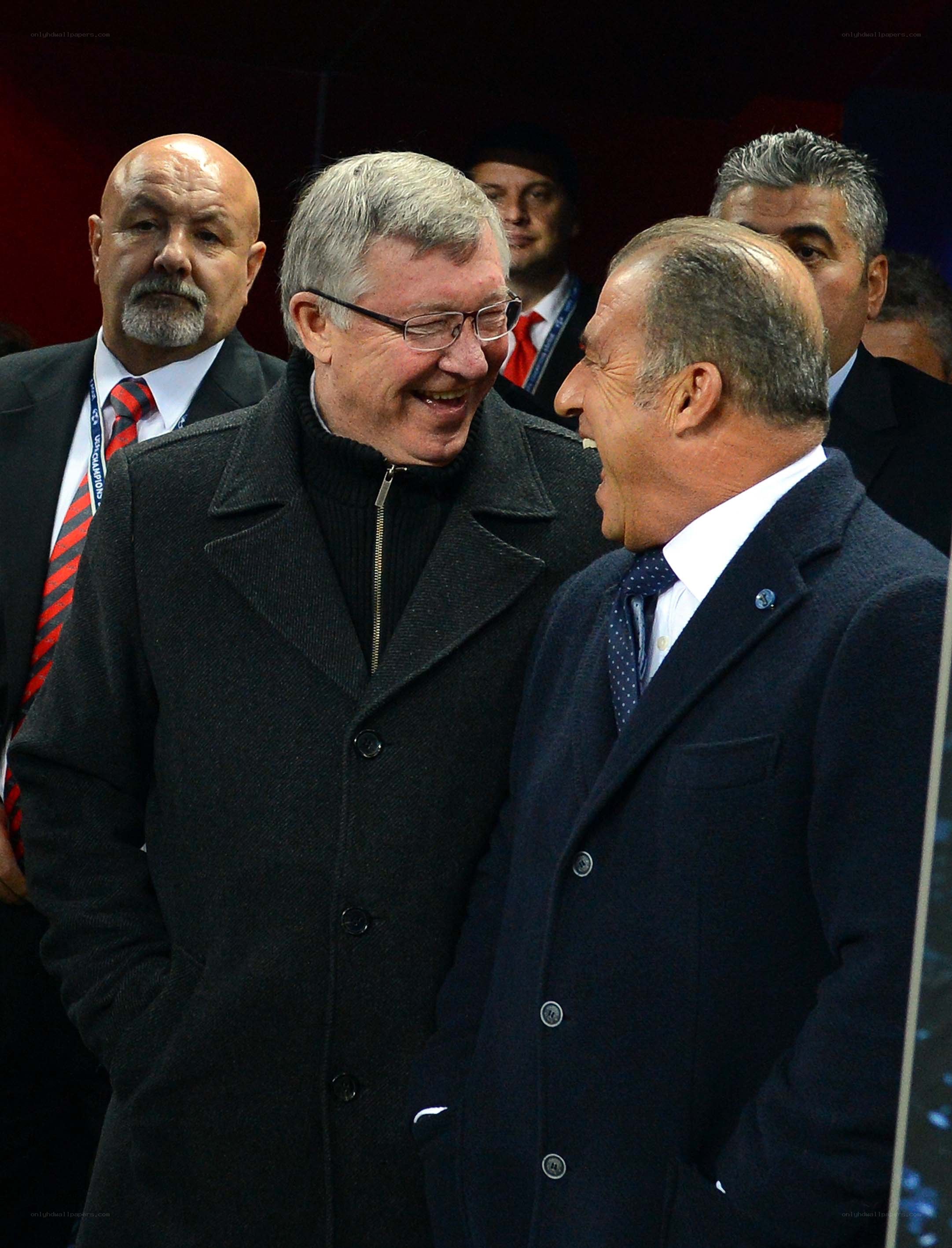 Men laughing at a stadium