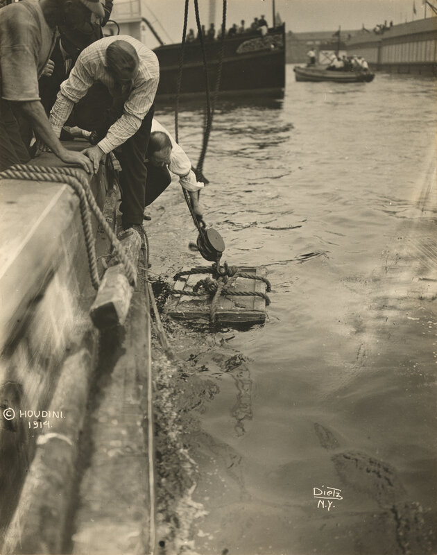 Men loading cargo onto a ship