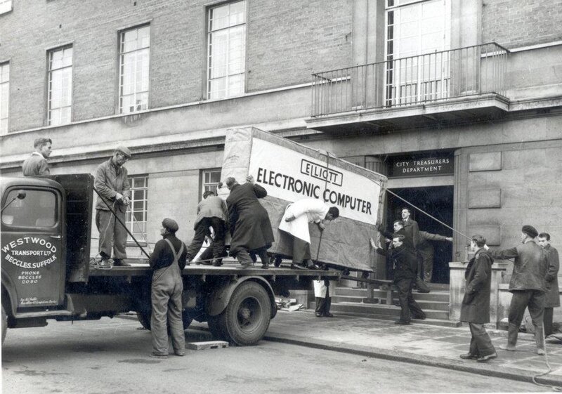 Men Moving Computer