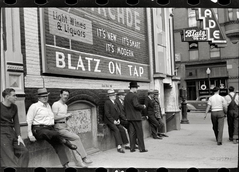 Men on a City Sidewalk