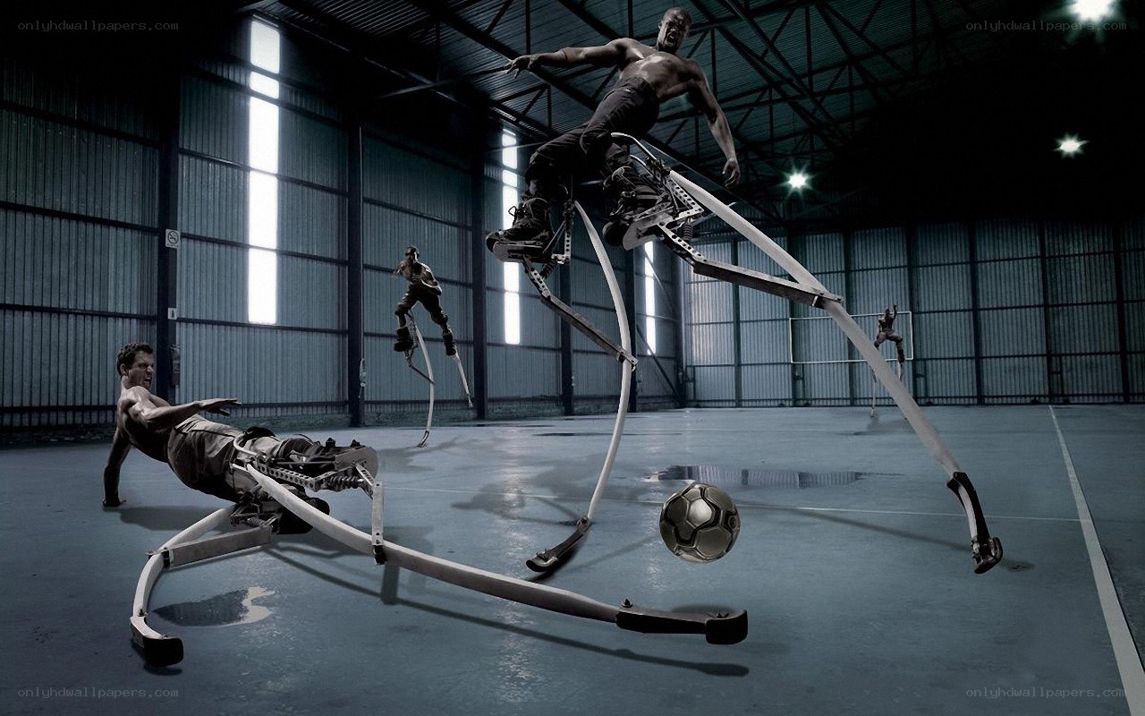 Men on spring-loaded stilts playing soccer